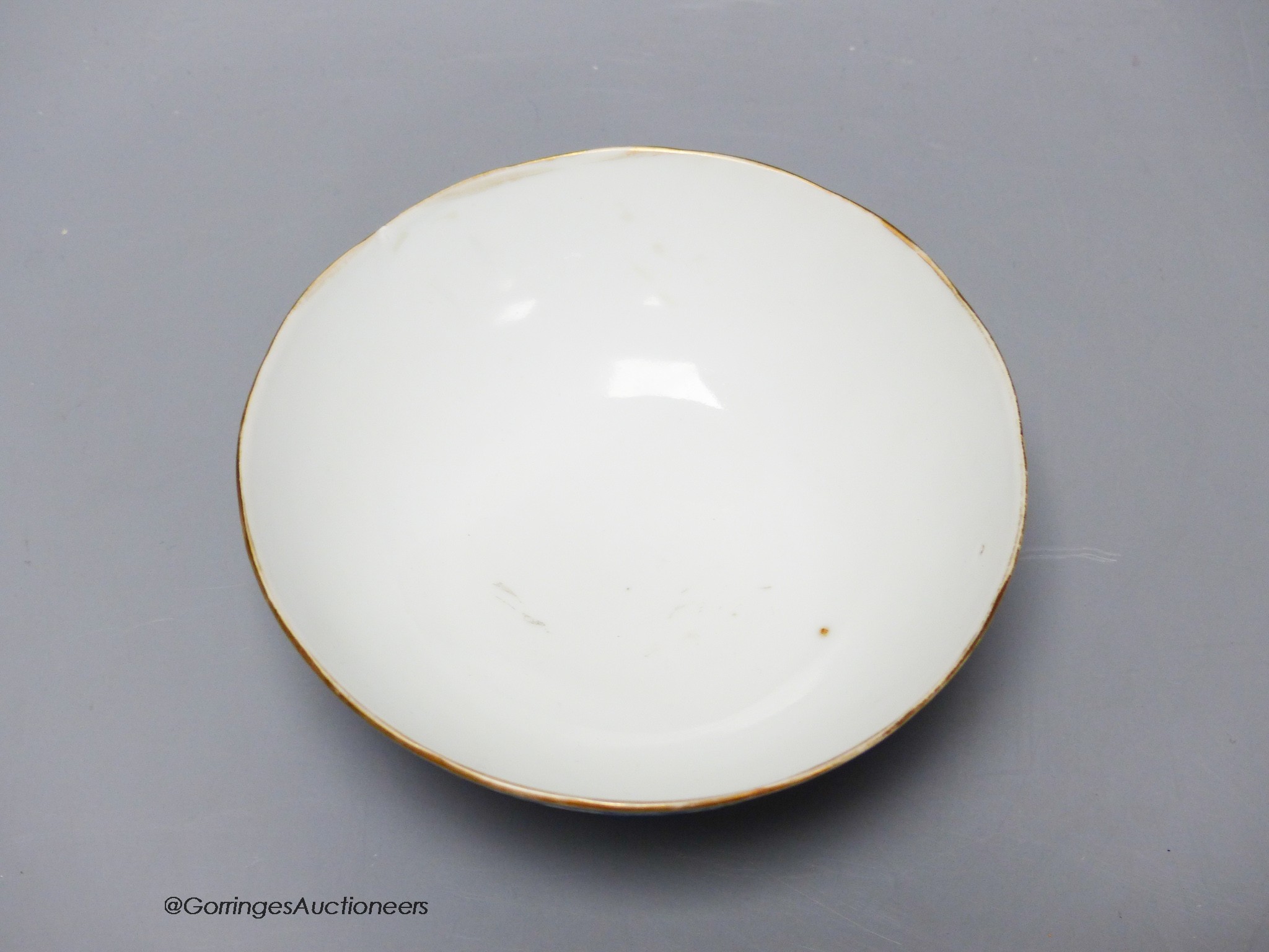 A Chinese blue ground bowl, Tongzhi mark and period (1862-74), 13cm diameter